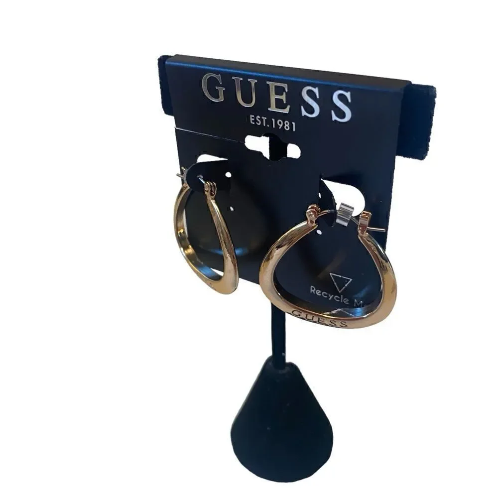 Bright Gold Toned Guess Embossed Earrings.
